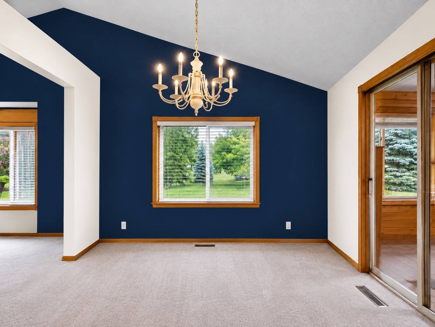 AI mockup of a Ham Lake living room with a navy vaulted accent wall