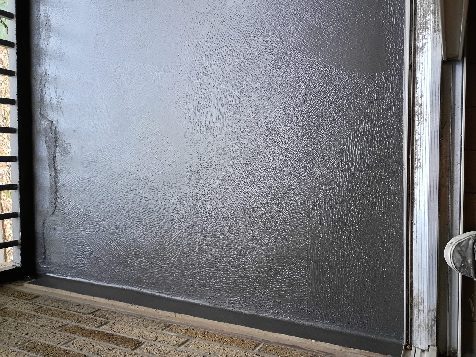 Finished satin Forte coat on textured St. Paul balcony floor
