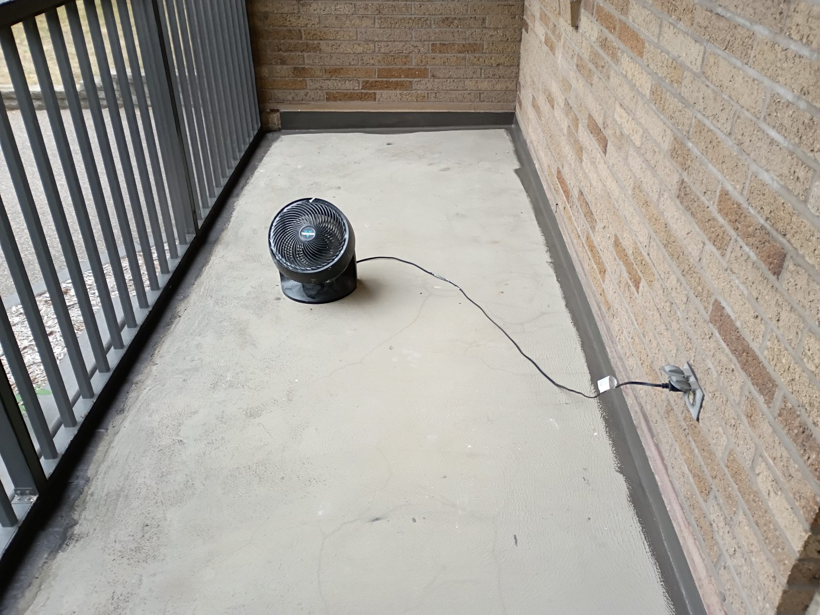 St. Paul apartment balcony floor during Forte application