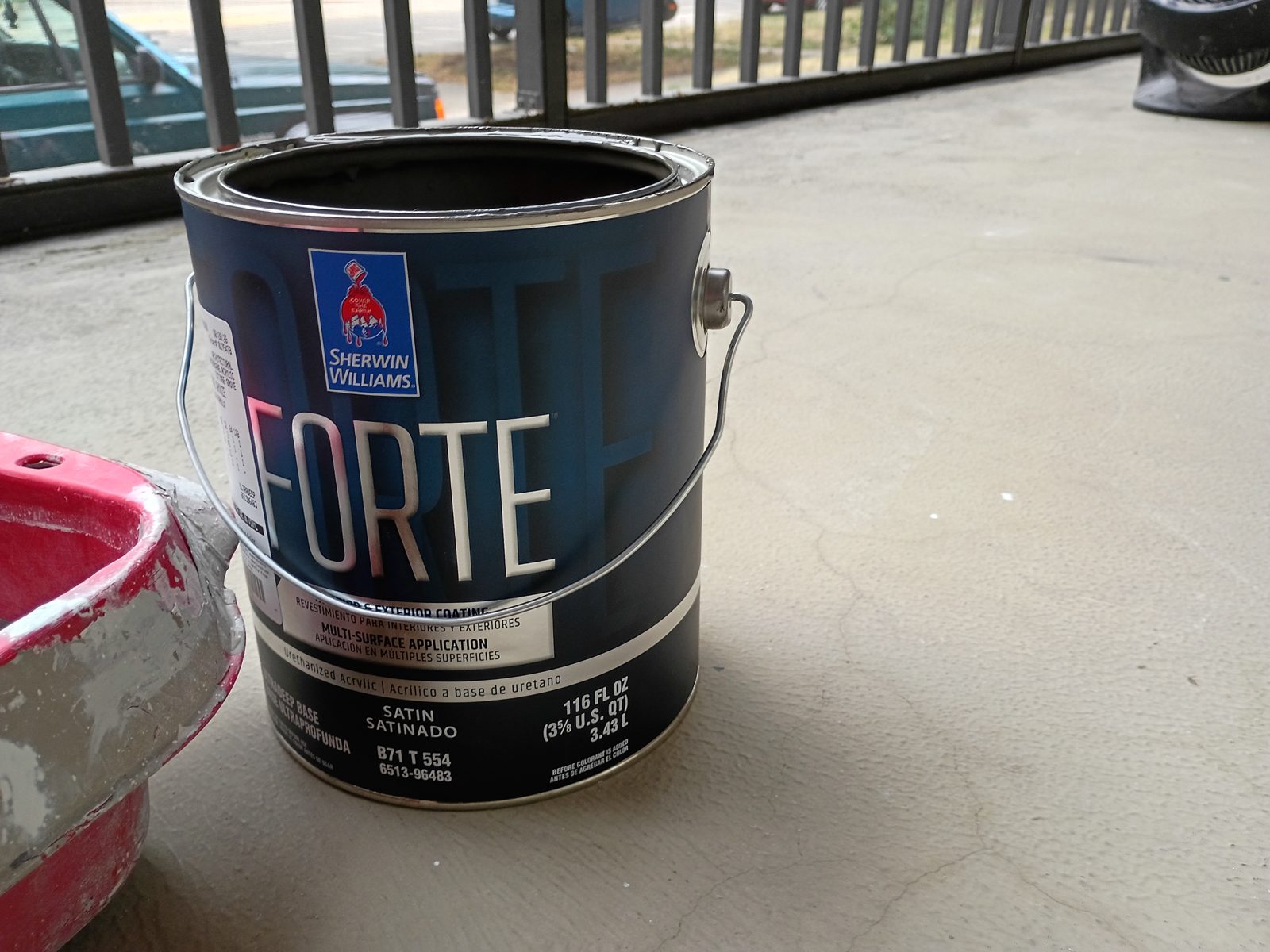 Sherwin-Williams Forte satin can on a St. Paul apartment balcony