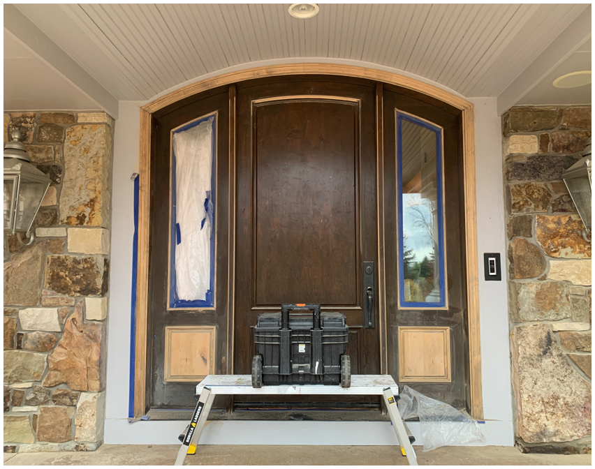 Door refinishing in progress